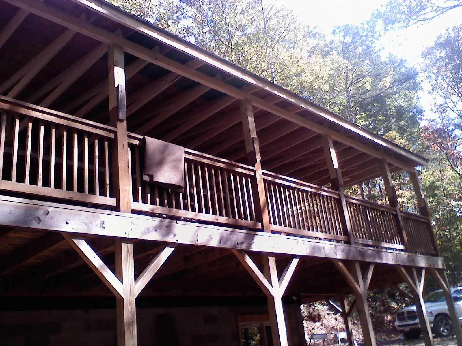Timber framing under a new elevated porch and deck — Roof Leak Repair in New Prague by Roofing Brothers